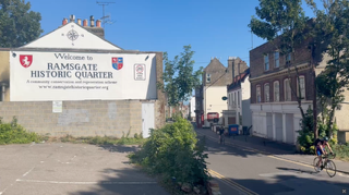 A photograph of some historic buildings. A banner on the side of one reads 'Ramsgate Historic Quarter'.