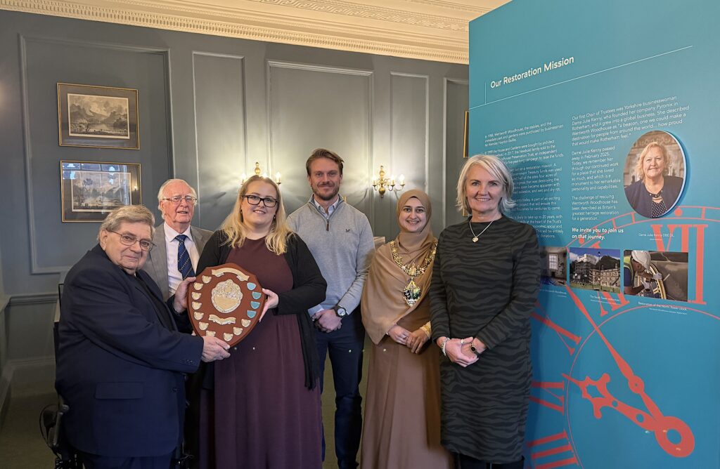 Members of Dame Julie's, and fellow heritage champions, family accept the award in her honour.