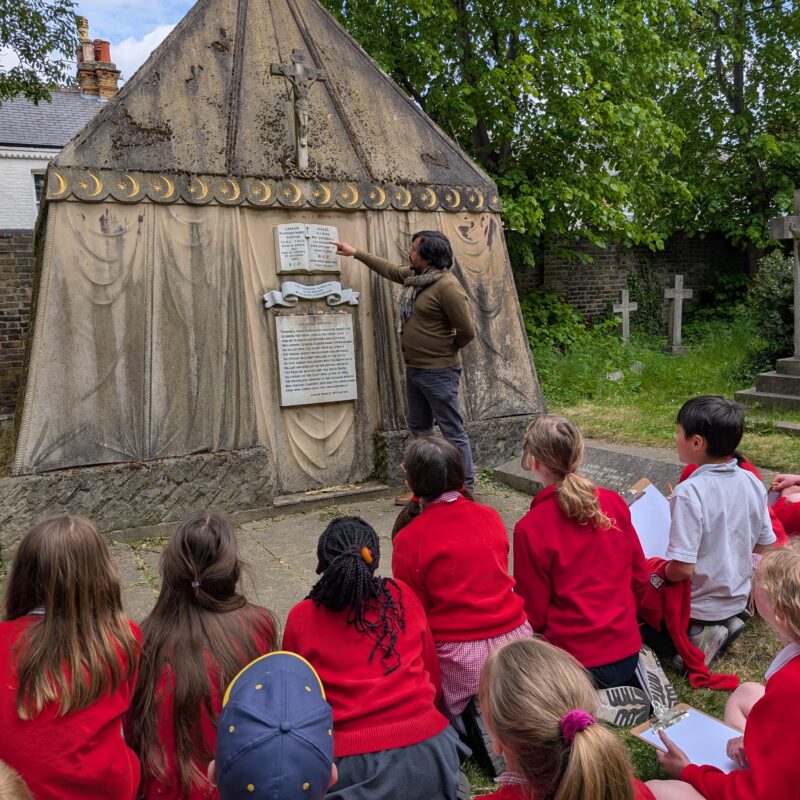 Photograph of an educational visit to the Burton mausoleum.