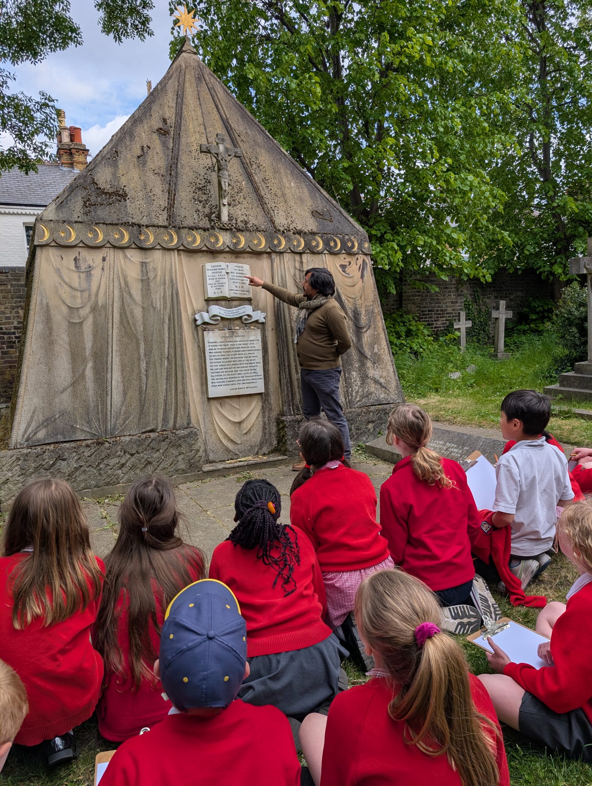Photograph of an educational visit to the Burton mausoleum.
