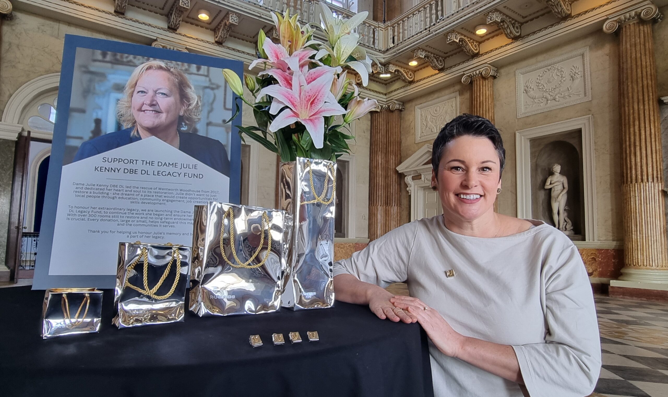Silversmith Rebecca Joselyn is pictured in Wentworth Woodhouse’s majestic Marble Saloon with the Be More Julie collection.