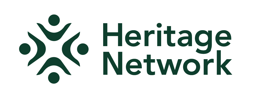 Heritage Network logo. Dark green text on a white background