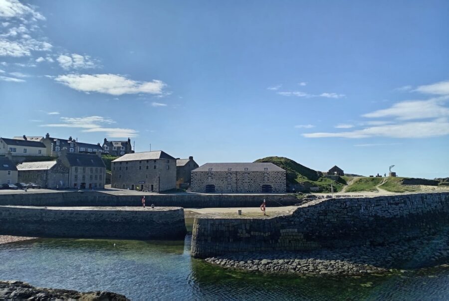 Photograph of Portsoy harbour on a sunny day.
