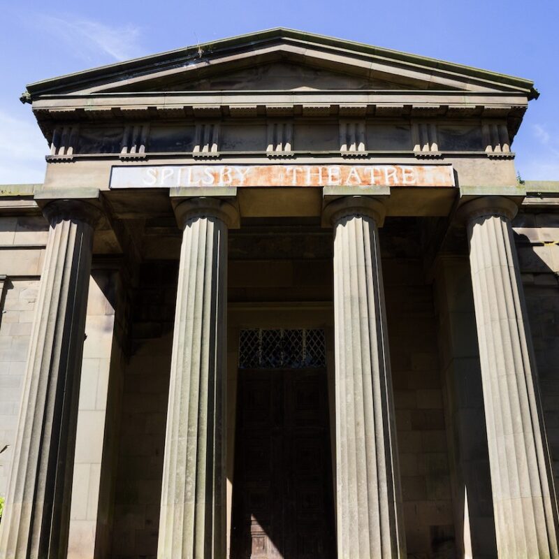 Spilsby House, a heritage building in the style of neo-classical architecture. A building with a Grecian temple style roof, supported by four pillars.